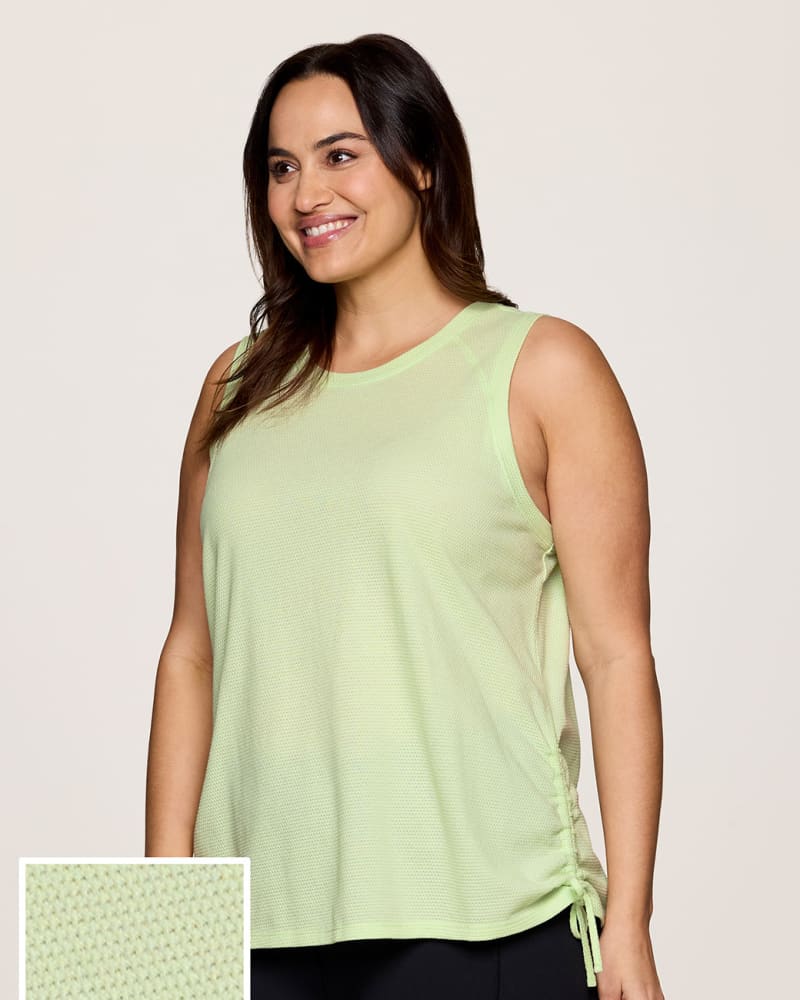 Front of a model wearing a size 2X Plus Day Dreamer Ruched Tank in Light Green by RBX Active. | dia_product_style_image_id:341680